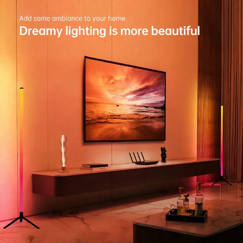 Axendris 120cm LED RGB floor lamp bar with sound pickup ambient lighting, creating a warm glow in a modern living room.