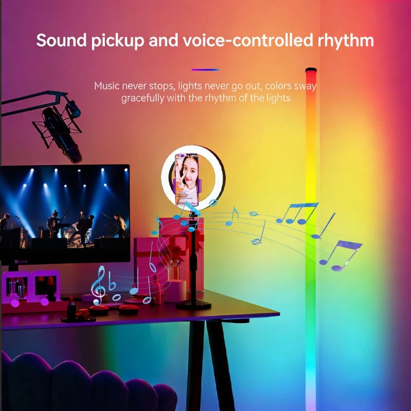 Axendris 120cm LED RGB floor lamp in a corner, featuring sound-activated colour-changing light for gaming rooms.
